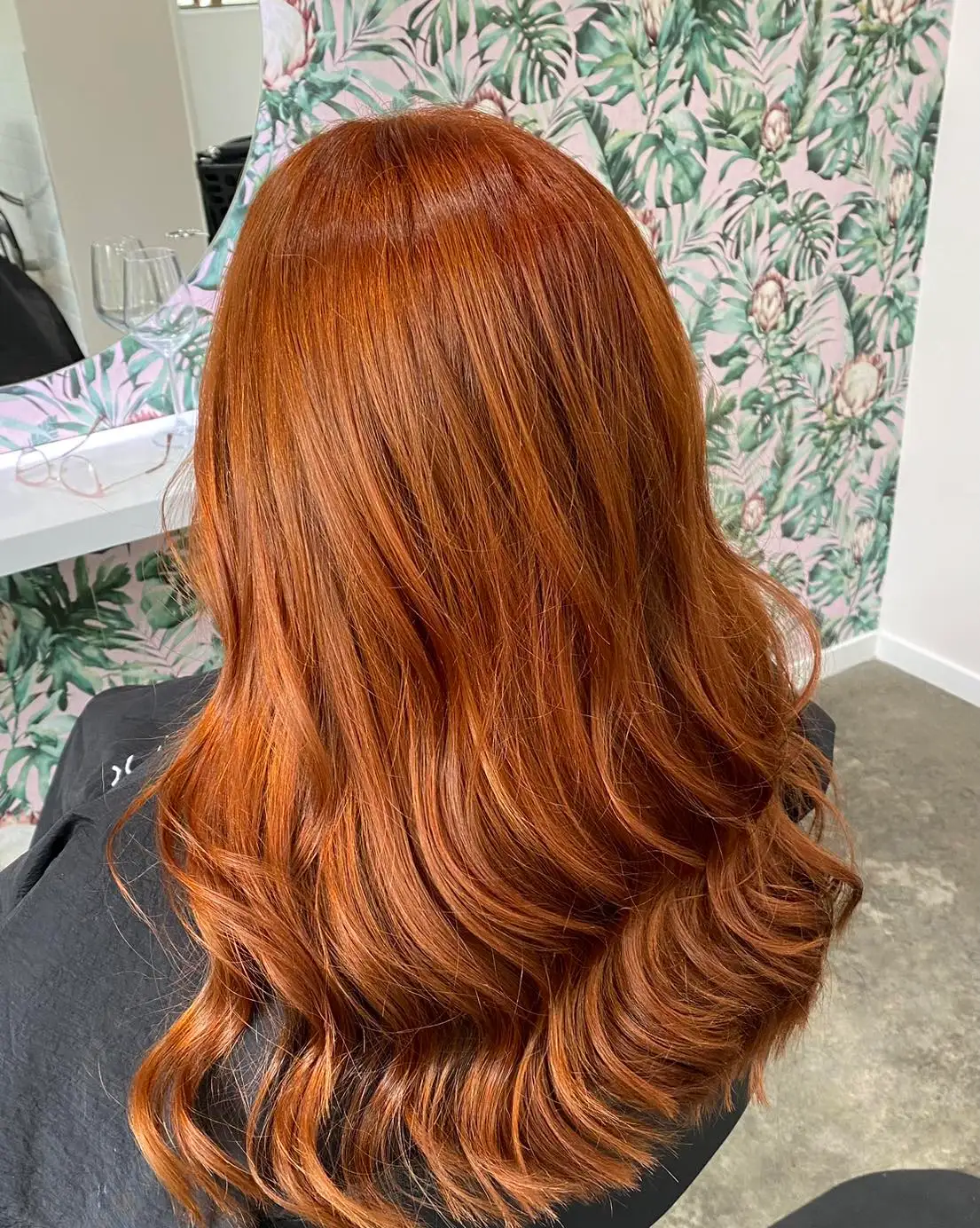 Back view of long vivid copper auburn waves